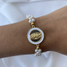 Pulsera virgen tejida perla